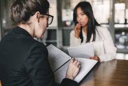 two women in a meeting