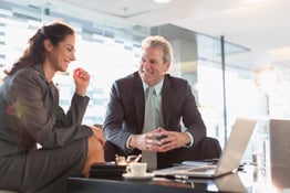 Business woman and business man meeting