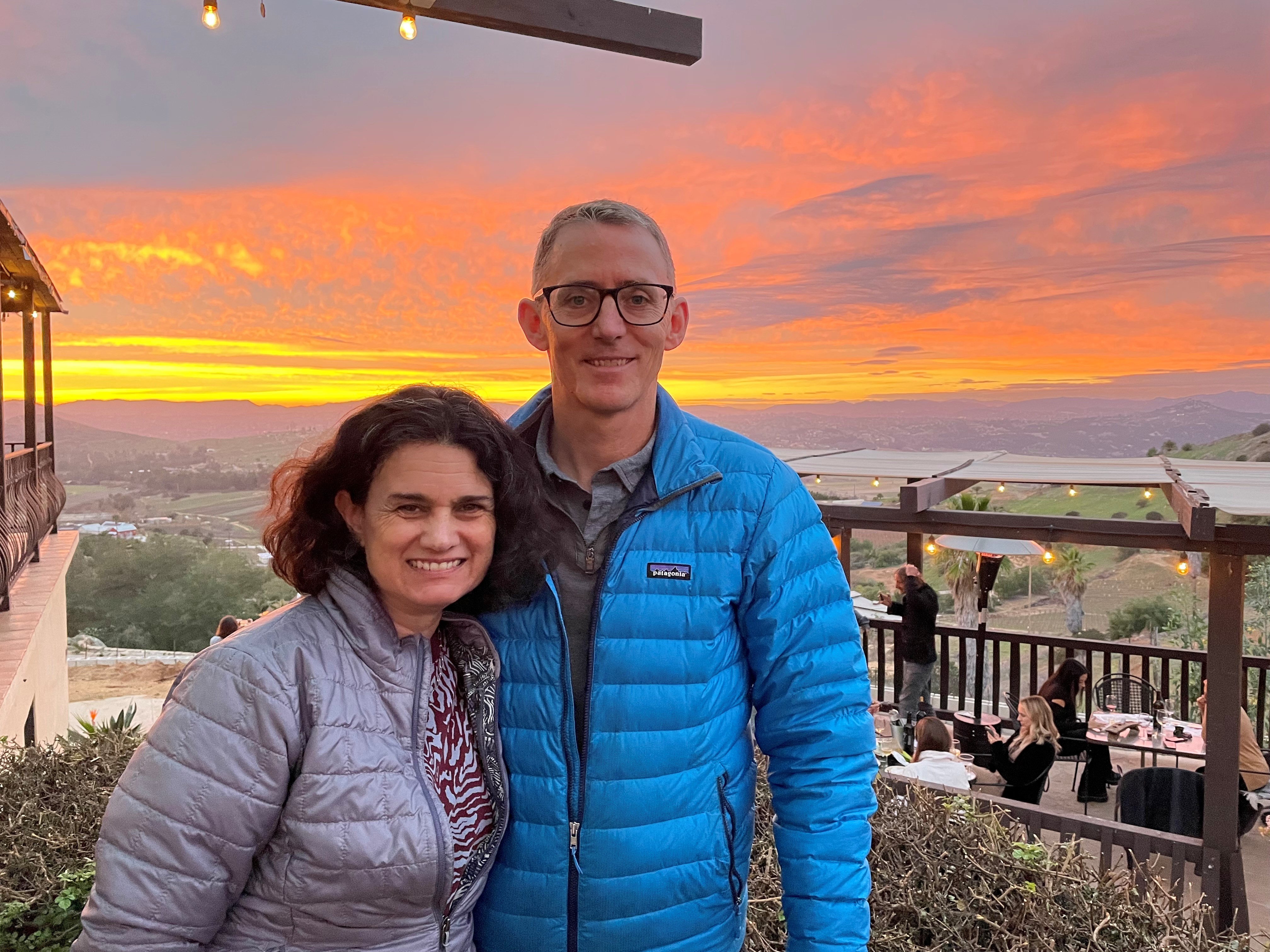 Shad Butte with his Wife at sunset on a balcony